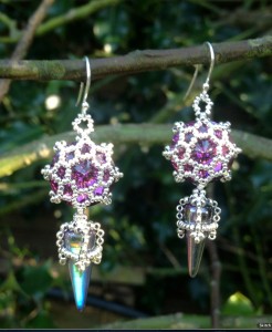 Swarovski rivolis trapped in filigree beadwork like tiny stained glass windows, with delicately beaded Czech spikes suspended below. These Tatiana Earrings are worked by modifying some components of the St Olave necklace.